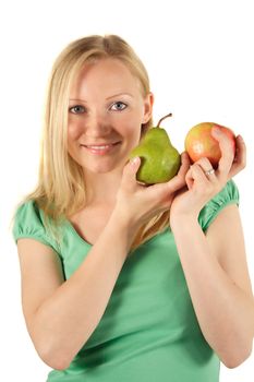 A young handsome woman holding an apple and a pear. All isolated on white background.