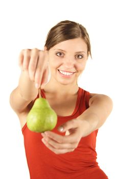 A young handsome woman holding a pear. All isolated on white background.