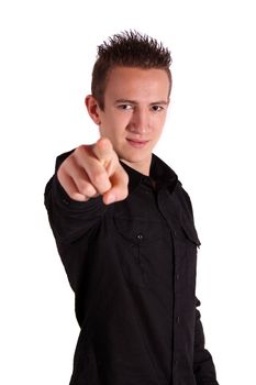 A young handsome man points at something or someone. All isolated on white background.