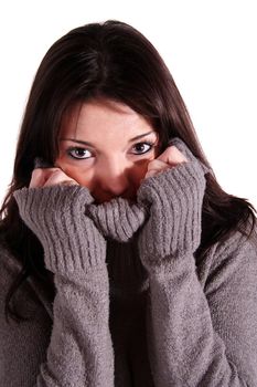 A handsome young woman freezing. All isolated on white background.