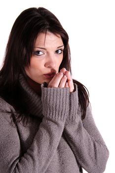 A handsome young woman freezing. All isolated on white background.