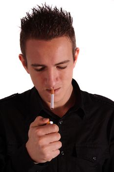 A young smoker lights a cigarette. All isolated on white background.