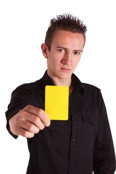 A young handsome man shows someone a yellow card. All isolated on white background.