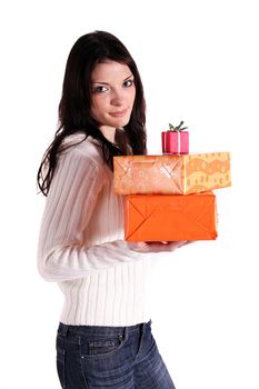 A handsomeyoung woman holding a pile of presents. All isolated on white background.