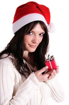 A handsome young woman holding a small red present. All isolated on white background.