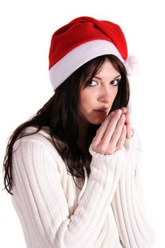 A freezing girl wearing a christmas cap. All isolated on white background.