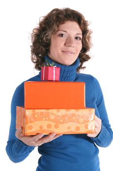 A handsome young woman holding a pile of fine wrapped presents. All isolated on white background.