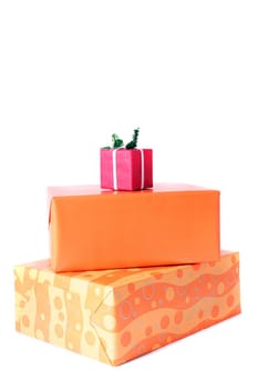 Several gifts in different sizes in front of white background.