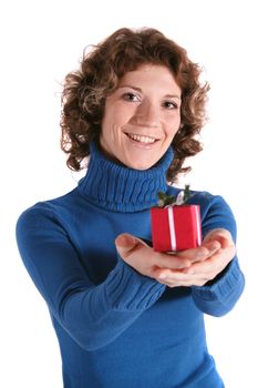 A handsome young woman holding a small red presents. All isolated on white background.