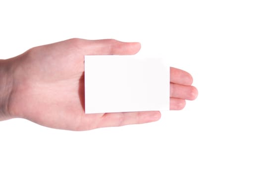 A hand holds a blank business card. Isolated on white background.