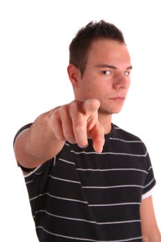 A handsome young man pointing at someone or something. All isolated on white background.