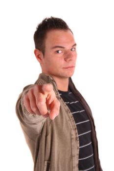 A young handsome man points at something or someone. All isolated on white background.