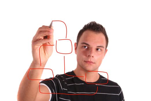 A handsome young man draws a flowchart. All isolated on white background.