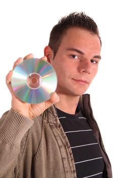 A handsome young man holding a cd or dvd. All isolated on white background.