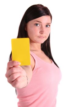 A handsome young woman shows someone a redcard. All isolated on white background.