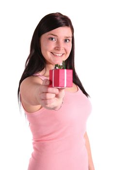 A handsome young woman holding a small red presents. All isolated on white background.