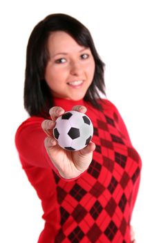 A young handsome woman olding a small soccer ball. All isolated on white background.