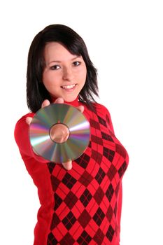 A young woman bending a cd or dvd. All isolated on white background.
