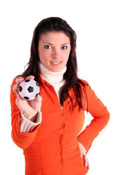 A young handsome woman olding a small soccer ball. All isolated on white background.