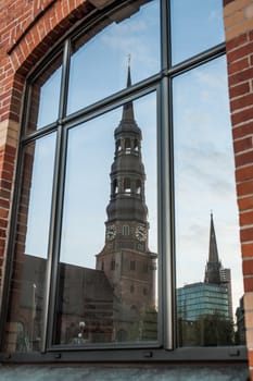 Mirroring of the St. Michaelis Church in a building in the Old Warehouse District