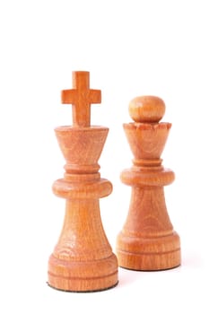Chessmen standing side by side. All isolated on white background.