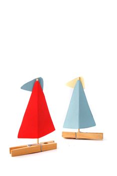 Two tinkered boats on a sailing trip. All isolated on white background.