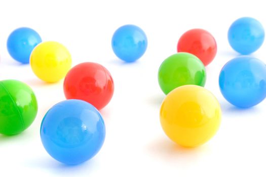 Several colored balls. All isolated on white background.
** Note: Shallow depth of field.