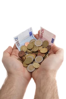 Two hands holding some cash and several bank notes. All isolated on white background.