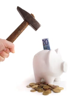 A person smashes a piggybank. All isolated on white background.