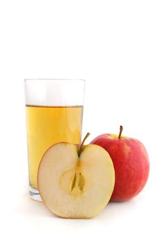 A glass of fine apple juice. All isolated on white background.