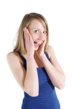 An amazed woman in front of white background.