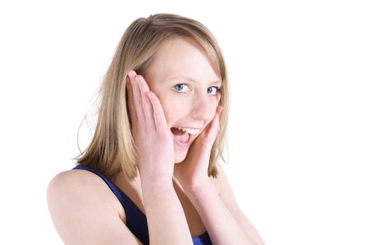 An amazed woman in front of white background.