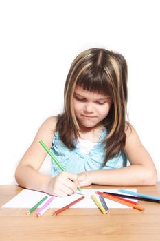 A young girl painting a picture. All isolated on white background.