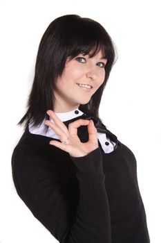 An attractive young woman does an positive gesture. All isolated on white background.