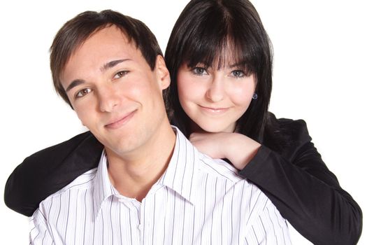 A handsome young couple in front of a plain white background.
