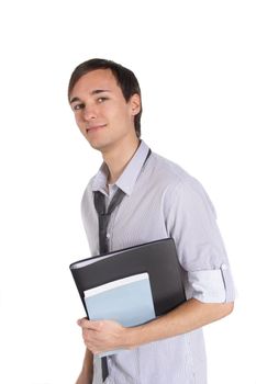 A handsome student holding his documents while standing in front of a white background.