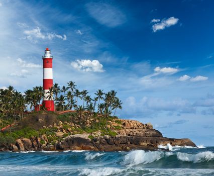 Old lighthouse and waves of  sea. Kovalam (Vizhinjam) Kerala, India