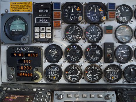 Aircraft cockpit: engine and fuel instruments in flight.