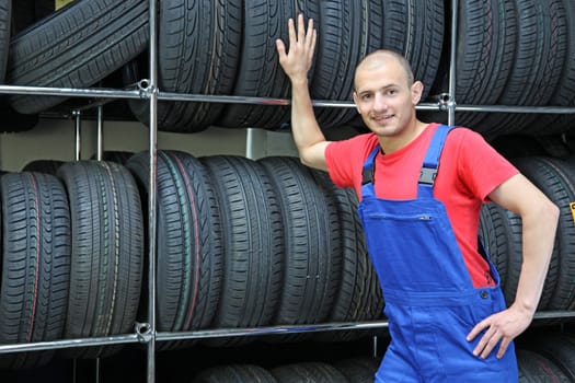 A trustful worker in a tire workshop.
** Note: Slight blurriness, best at smaller sizes.