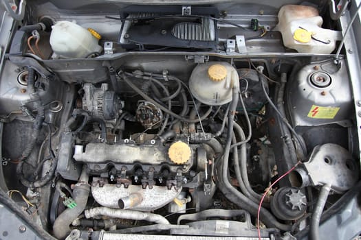 Detail image of an engine block of a car.