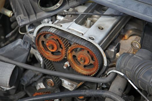 Detail image of an engine block of a car.