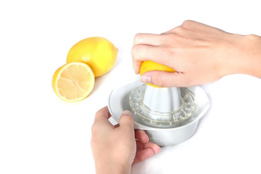 A person cutting lemons. All isolated on white background.
** Note: Shallow depth of field.