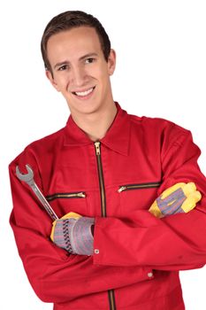 A young mechanic trainee. All isolated on white background.