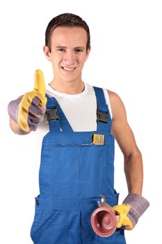 A young plumber trainee. All isolated on white background.