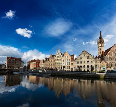 Europe Belgium medieval town travel background - Ghent canal and Graslei street on sunset. Ghent, Belgium