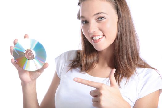 An attractive young woman holding a CD-Rom or DVD.  All isolated on white background.