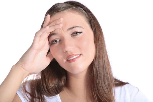 An attractive young woman suffers from a headache. All isolated on white background.