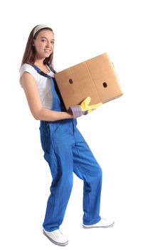 Full length shot of an attractive young woman carrying a moving box. All isolated on white background.