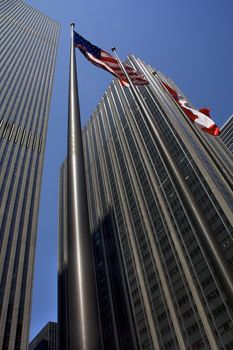 Steel Buildings Skyscrapers American and Canadian Flags New York City