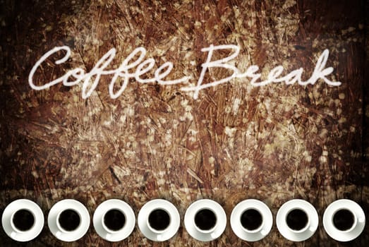 Coffee cup on grunge wood table, Coffee break concept 